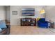Inviting living room with stylish decor, comfortable seating, and modern entertainment center at 3467 Buoy Cir, Winter Garden, FL 34787