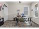 Dedicated office space with a large desk, comfortable chair, and natural light at 3467 Buoy Cir, Winter Garden, FL 34787