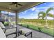 Relaxing screened patio with comfortable seating and a picturesque view of the lush backyard at 3467 Buoy Cir, Winter Garden, FL 34787