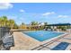 Beautiful pool area with lounge seating and covered gazebo near the community center at 3467 Buoy Cir, Winter Garden, FL 34787