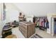 Spacious walk-in closet showcasing ample shoe storage and a central island dresser at 4207 Bair Ave, Fruitland Park, FL 34731