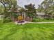 Charming single-story home with a lush lawn and mature landscaping at 4207 Bair Ave, Fruitland Park, FL 34731