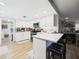 Bright kitchen with stainless appliances, and a breakfast bar at 4207 Bair Ave, Fruitland Park, FL 34731