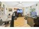 Office area with plenty of natural light and a comfortable sitting area at 4207 Bair Ave, Fruitland Park, FL 34731