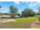 The home features a spacious, well-maintained backyard with a concrete slab, perfect for outdoor enjoyment at 4401 Abaco Dr, Tavares, FL 32778
