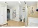 A bathroom with double door access to the walk-in shower, toilet, and extra storage at 4401 Abaco Dr, Tavares, FL 32778