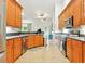 Bright kitchen with stainless appliances and plenty of counter space for meal preparation at 4401 Abaco Dr, Tavares, FL 32778