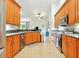 Spacious kitchen with stainless steel appliances and granite countertops at 4401 Abaco Dr, Tavares, FL 32778