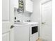 Laundry room featuring side by side washer and dryer units at 4401 Abaco Dr, Tavares, FL 32778