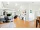 Open-concept living room showcasing an office space, dining area and archways at 4401 Abaco Dr, Tavares, FL 32778