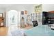 Home office with tile flooring, desk, and shelving unit at 4401 Abaco Dr, Tavares, FL 32778