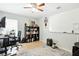 Office space features tile flooring, white board and large shelving unit at 4401 Abaco Dr, Tavares, FL 32778