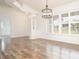 Dining room highlighting hardwood floors, natural light and modern lighting fixtures at 5005 County Road 125B1, Wildwood, FL 34785