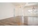 Bright living room boasting hardwood floors and plenty of natural light at 5005 County Road 125B1, Wildwood, FL 34785