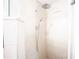 Modern shower with rainfall showerhead and tiled walls at 5005 County Road 125B1, Wildwood, FL 34785