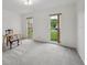Large bedroom with natural light and space for a desk or seating area at 550 Floral Dr, Kissimmee, FL 34743