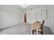 Bedroom showing desk and door to bathroom at 550 Floral Dr, Kissimmee, FL 34743