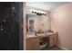 Bathroom with a double sink vanity, shower and bathtub combination, and a neutral color scheme at 6001 Pine Bluff Ln, Mascotte, FL 34753