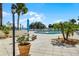 Community pool and patio area perfect for entertaining, with plenty of chairs and room to relax at 601 N Mcdonald St # 2, Mount Dora, FL 32757