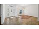 Bright foyer with tile floors and a stylish chandelier at 6048 Tremayne Dr, Mount Dora, FL 32757