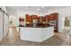 Spacious kitchen with granite countertops and stainless steel appliances at 6048 Tremayne Dr, Mount Dora, FL 32757