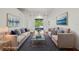 Comfortable staged living room with stylish furniture and decor at 6048 Tremayne Dr, Mount Dora, FL 32757