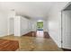 Spacious living room featuring hardwood floors and lots of natural light at 6048 Tremayne Dr, Mount Dora, FL 32757