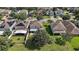 Aerial shot of the back of the home showing the covered patio and trampoline at 621 Lost Grove Cir, Winter Garden, FL 34787