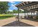 Cozy outdoor patio with a brick floor, fireplace, and comfortable seating for outdoor living at 621 Lost Grove Cir, Winter Garden, FL 34787