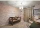Charming Bedroom with floral wallpaper, chandelier, and a cozy crib at 621 Lost Grove Cir, Winter Garden, FL 34787