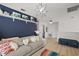 The bonus room includes a rainbow carpet and playful design elements at 621 Lost Grove Cir, Winter Garden, FL 34787