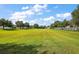 Expansive green space, perfect for outdoor activities and enjoying nature at 621 Lost Grove Cir, Winter Garden, FL 34787