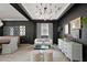 Stylish living area featuring contemporary furniture, modern lighting, and decorative accents at 621 Lost Grove Cir, Winter Garden, FL 34787