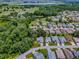 Desirable home in a well-manicured neighborhood boasting lush landscaping and mature trees at 627 Timbercrest Dr, Leesburg, FL 34748