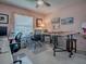Bright office space with two desks, comfortable seating, and natural light at 627 Timbercrest Dr, Leesburg, FL 34748