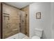 Shower room complete with glass door and neutral tiles at 628 Drew Ave, Clermont, FL 34711