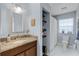 Bright bathroom features granite counters and a tub/shower combo at 628 Drew Ave, Clermont, FL 34711