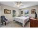 Cozy bedroom with vintage accents and ample natural light at 628 Drew Ave, Clermont, FL 34711