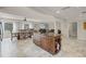 Spacious kitchen featuring a large island, stainless steel appliances, and an adjacent dining area at 628 Drew Ave, Clermont, FL 34711