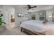 Bright and spacious bedroom with a bed, TV and an ensuite bathroom at 628 Drew Ave, Clermont, FL 34711