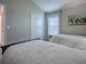 Bedroom view showcasing a closet and window providing ample natural light at 6295 Danielson Loop, The Villages, FL 32163