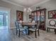 Formal dining area with a stylish table, chairs, built-in hutch, and elegant decor at 6295 Danielson Loop, The Villages, FL 32163
