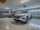 Clean, organized three-car garage with epoxy flooring and plenty of storage space at 6295 Danielson Loop, The Villages, FL 32163