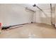 Spacious, unfinished garage interior with ample room for storage and future customization at 6829 Bittersweet Ln, Orlando, FL 32819