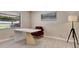 The office features a modern desk, comfortable seating, and natural light, perfect for working from home at 6829 Bittersweet Ln, Orlando, FL 32819