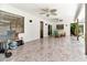 Enjoy the covered patio with ceiling fans and ample space for outdoor entertaining and relaxation at 6829 Bittersweet Ln, Orlando, FL 32819