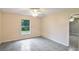 Bedroom with neutral walls, ceiling fan, and natural light at 8634 Garden Way Rd, Groveland, FL 34736