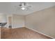 Inviting living area with tile flooring and a ceiling fan at 8634 Garden Way Rd, Groveland, FL 34736