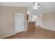 Inviting living area with tile flooring, a ceiling fan, and neutral paint at 8634 Garden Way Rd, Groveland, FL 34736