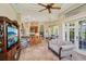 Open concept living area showcasing a seamless flow to breakfast nook and outdoor patio access from a modern layout at 9433 San Miguel, Howey In The Hills, FL 34737